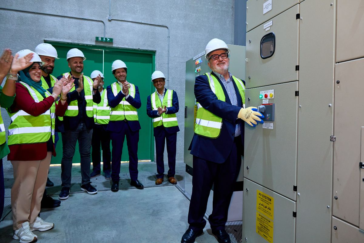 Nizar Taha, Executive Chairman of TIG Holding, together with Sumayya Taha, Strategy & Business Excellence Director, and Claudio Fabiani, General Manager of EIP, during the inauguration of EIP's new rooftop solar power plant.